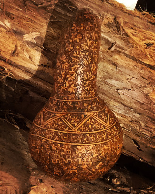 See also #9 Peruvian Burned & Carved Gourd