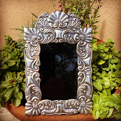 See also #8 Repoussé Silver Frame on Wood